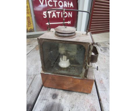 A GWR signal lamp interior with copper reservoir and ceramic burner