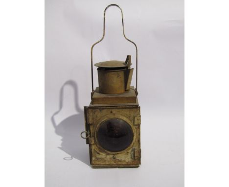 A white painted railway tail lamp