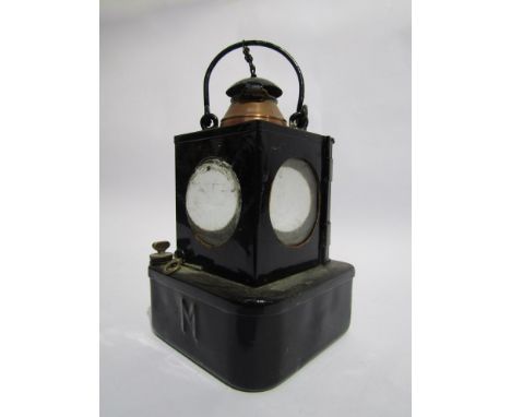 A signal lamp interior stamped HOLME