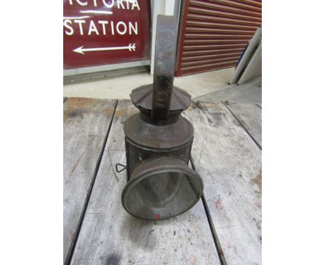 A two aspect hand lamp stamped LNER LOCO on the side and CAMBS 997 to handle