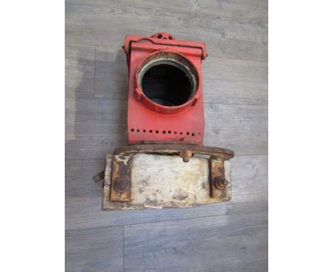 A red painted signal lamp case, mounted for level crossing gates, reputedly from PULHAM MARKET station