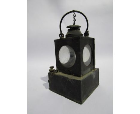 A LNER signal lamp interior with metal burner and chimney