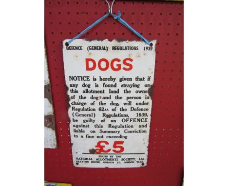 An enamel sign: "Dogs" Defence (General) Regulations 1939, 8" x 13" 