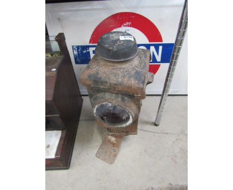 A B.R (E) crossing gate lamp exterior on bracket with two red convex lenses