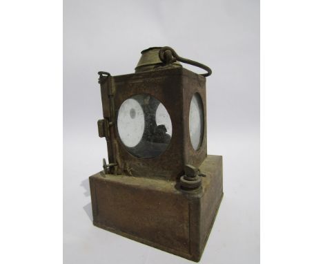 A signal lamp interior stamped DEREHAM with brass burner