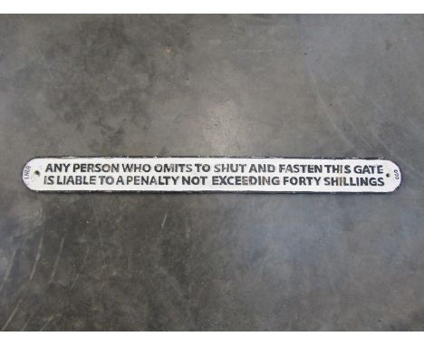 A cast iron LNER sign 'ANYONE WHO OMITS TO SHUT AND FASTEN THIS GATE IS LIABLE TO A PENALTY NOT EXCEEDING FORTY SHILLINGS'