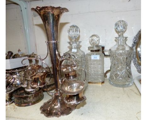 An EPNS mounted square cut locking decanter; 2 others; an EPNS epergne