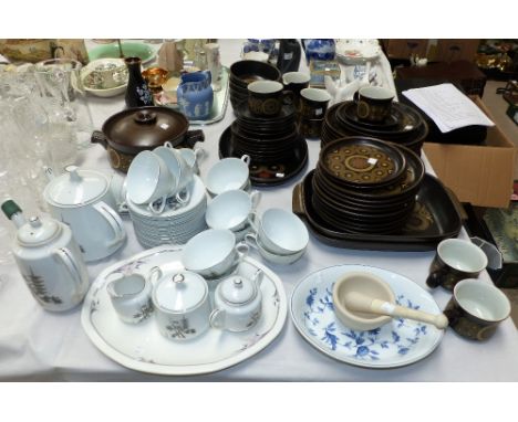 A 1970's Denby brown stoneware part dinner service; a Japanese "Kutani" white china part dinner and tea service