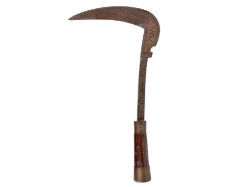 A Banochie tribal axe (lohar), pick shaped blade at right angles to the haft, blade and steel haft decorated with brass and c
