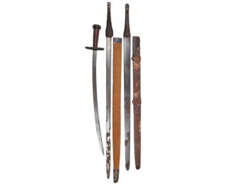 Two Omani swords: one with blade of traditional spatulate form 31 in., the other having a single edged fullered blade 32.5 in