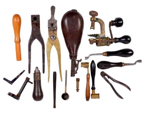 A quantity of vintage shooting accessories, including: powder measures, bullet moulds, cartridge loading tools, a nipple wren