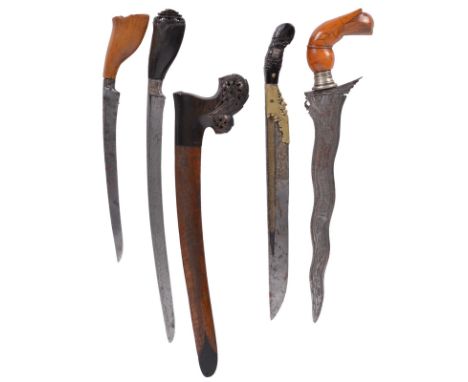 Four Asian knives, Sumatra (tumbok lada, or sewar), slender forward curving blade 9.5 in., horn hilt, wooden scabbard with ca