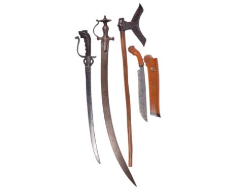 A collection of Indian and Eastern weapons, comprising: a fighting axe (bulova), Chota Nagpur, broad blade forming a concave 