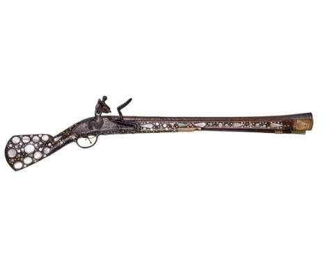 A Turkish flintlock blunderbuss, three-stage barrel 20.5 in., the muzzle section with moulded decoration and a medial ridge, 