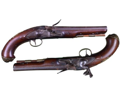 A pair of 18th Century English 20 bore flintlock pistols, by Edward North senior, swamped barrels 8 in., lightly engraved at 