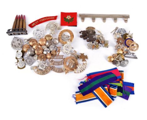 A collection of British Army insignia, including: a 14th Foot (Buckinghamshire) glengarry badge, gilt brass, central tiger ov