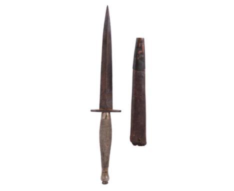 A Fairbairn-Sykes fighting knife, 2nd pattern, with lower part of original scabbard.