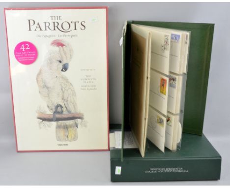 The Official Collection of World Wildlife First day covers in one album, another album and a set of prints of parrots 