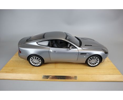 1/12 scale diecast James Bond Aston Martin V12 Vanquish as driven in Die Another Day in display case with framed COA