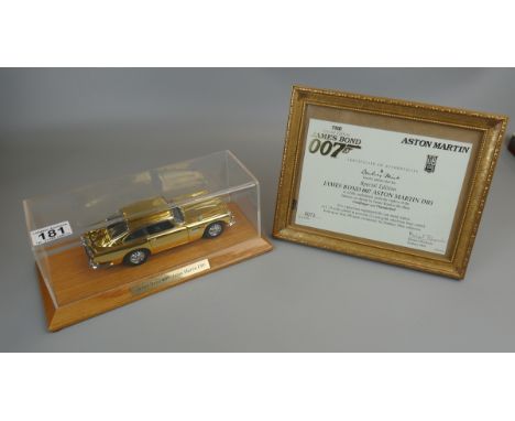 L/E 1/24 scale 22ct gold plated James Bond Aston Martin DB5 in display case with framed COA