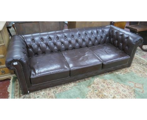 Brown leather chesterfield sofa