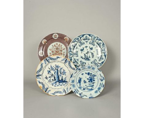 Three Bristol delftware chargers, c.1720-50, one painted in the Kraak manner with confronting cockerels within a floral panel