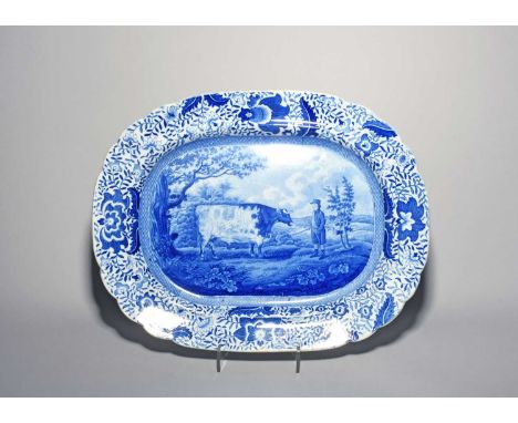 A blue and white transferware Durham Ox charger, 1st half 19th century, printed with the eponymous bull standing beside his o