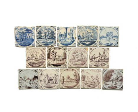 Fourteen English and Dutch delftware tiles, 18th century, painted in blue or manganese with scenes including the Stoning of S