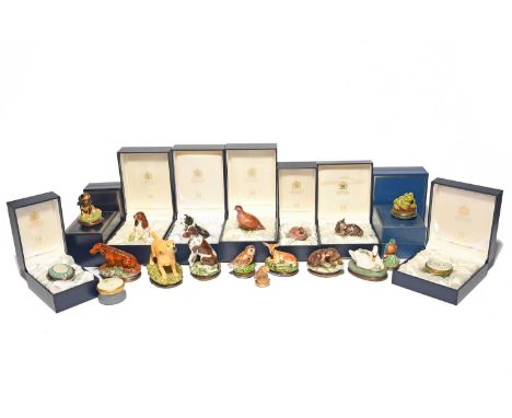 A collection of nineteen Halcyon Days enamel boxes or bonbonnières, modern, six modelled as dogs, six as birds, the others as