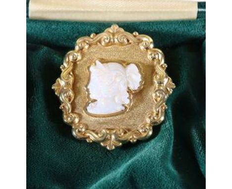 18ct gold carved plaque brooch set with central carved opal portrait panel, 18.2g.