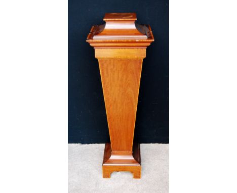 Edwardian inlaid mahogany pedestal, the stepped top over tapering trunk, plinth base and raised on bracket feet, 32cm wide, 1