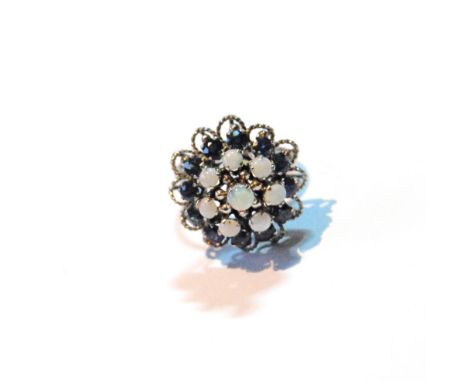 Sapphire and opal cluster ring in white gold filigree, '14k', size O.