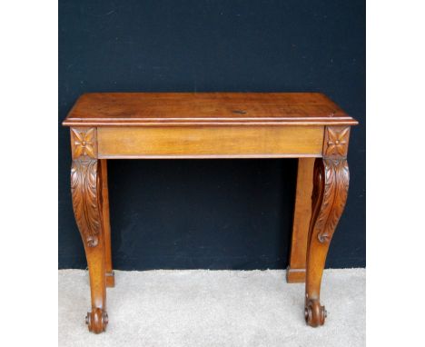 19th century oak console table, the moulded rectangular top over a beaded frieze, raised on acanthus carved cabriole legs ter