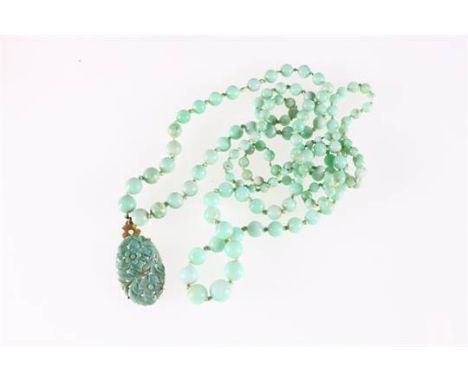 Graduated jadeite bead necklace with carved opal pendant, 96g.