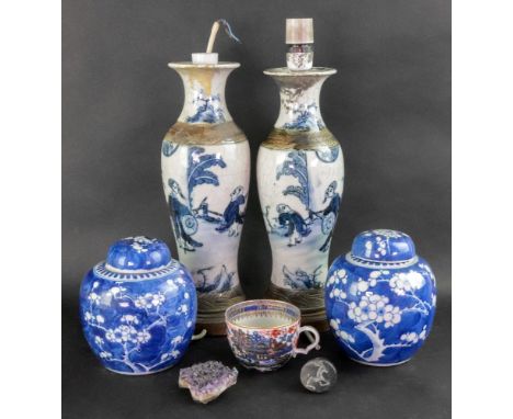 A pair of Chinese crackleglaze blue and white vases, painted with figures scenes, 30cm high, adapted as table lamps, a Chines