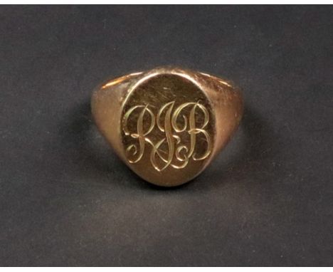 A gentleman's 18ct gold signet ring of oval design, engraved with initials, and to gold sizers to the band, 20.3g gross.