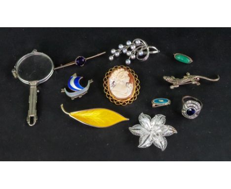 A small collection of jewellery, comprising a gilt metal mounted carved cameo brooch, carved with a head and shoulder portrai