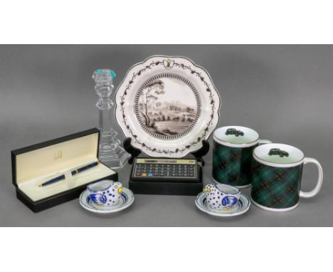 A Tiffany &amp; Co glass hexagonal candlestick, pair of Tiffany &amp; Co egg cups, pair of Dunhill tartan mugs, Dunhill ballp