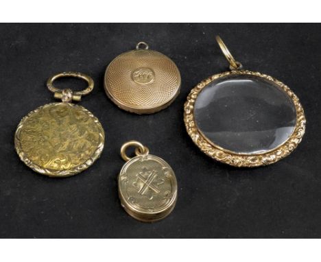 A George III circular memorial locket, engine turned enclosing a monogram and on the reverse side a lock of hair with monogra