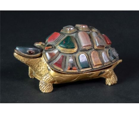 A gilt metal novelty necessaire, probably Italian, 19th century, in the form of a tortoise, the hinged shell set with coloure