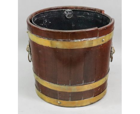 A George III style mahogany brass bound cylindrical wine cooler, 19th century, with brass lion mask ring handles, later lift-