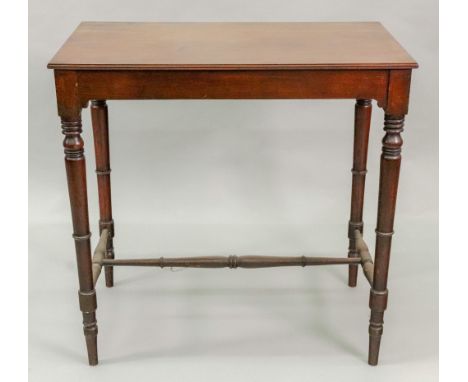 A Regency style mahogany side table, late 19th century, on ring turned legs united by stretchers, 73cm wide x 41.5cm deep x 7