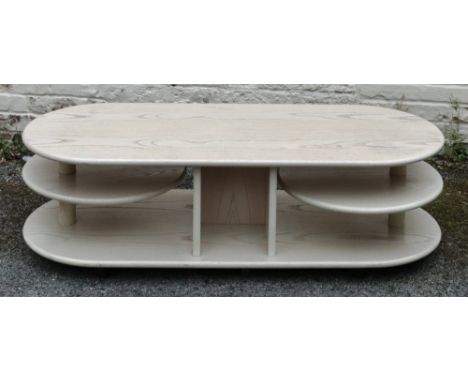 A G-Plan light oak low centre table, 129cm wide x 51cm deep x 41cm high.