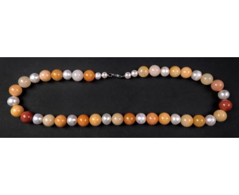 A fresh water cultured pearl, jasper, agate and jade necklace of slightly graduated design.