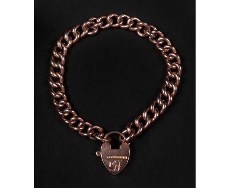 A 9ct rose gold flattened curb-link bracelet with heart locket, and bolt ring clasp, 13.9g gross.