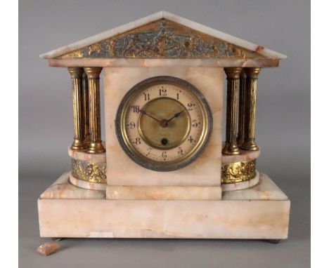 A French gilt metal mounted onyx marble mantel timepiece, late 19th century, of architectural style, 32.5cm wide x 29.5cm hig