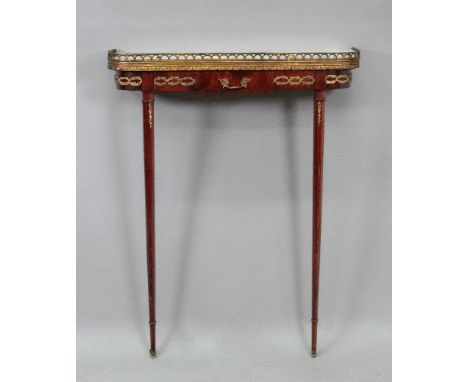 A reproduction Empire style mahogany gilt metal mounted console table, of narrow proportions, the veined marble top above a f