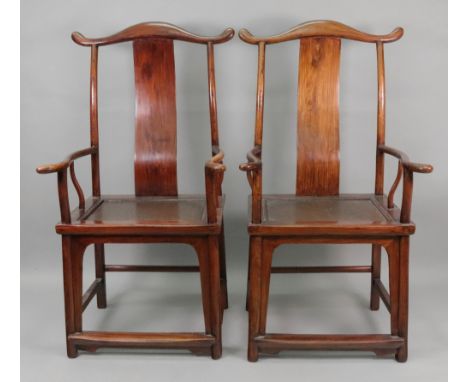 A pair of Chinese elm yoke-back open arm elbow chairs, 20th century, with high backs and sunken panel seats, 121cm high.

