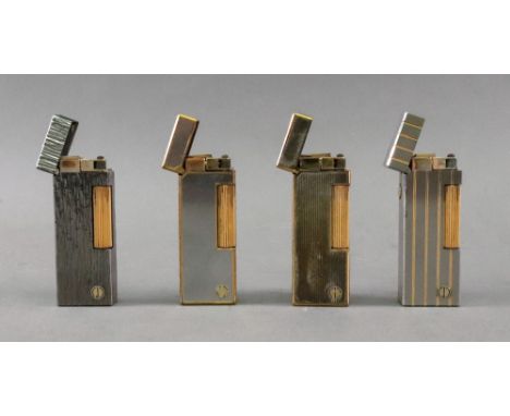 Four Alfred Dunhill lighters, including one with bark finish, one a brushed finish, one engine turned and one with brushed fi