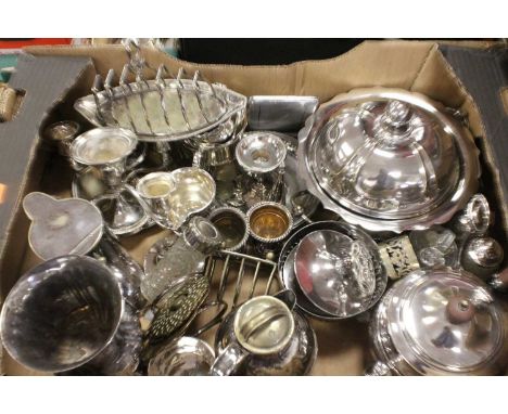 A box of miscellaneous silver plated wares to include include pocket cigarette case, chamber stick, candle snuffer, toast rac